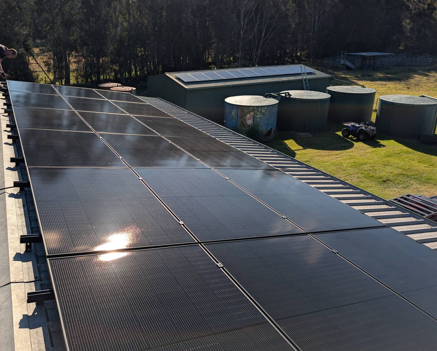 All-black Jinko solar array on a rural shed roof, Quorrobolong NSW